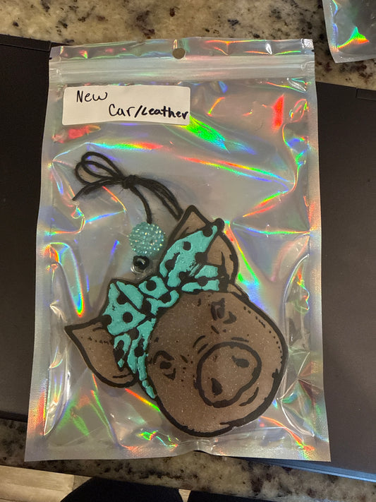 Pig with bow